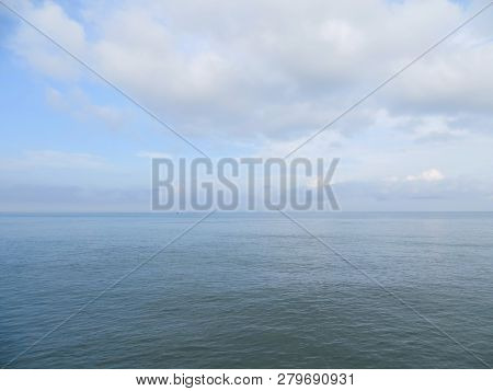 The Calm Sea Of Sunda Strait With Cloudy Horizon.