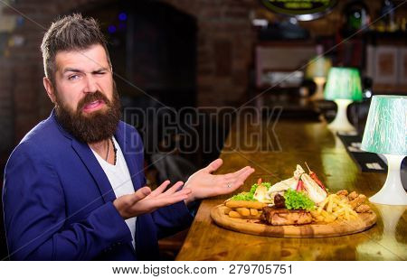 Man Received Meal With Fried Potato Fish Sticks Meat. Delicious Meal. Enjoy Meal. Cheat Meal Concept