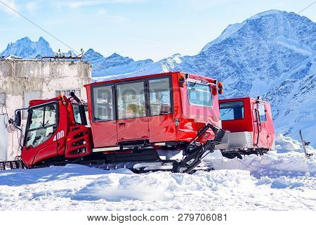 Rescue Machine For Clearing Snow And Searching For People After An Avalanche. Elbrus. Mountain Range