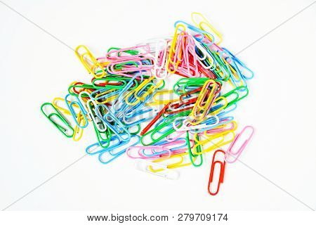 Top View Mix Colorful Paper Clips  On White Background. Color Clips For A Papera ,device Used To Hol