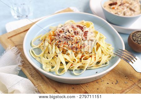 Italian Cuisine: Tagliatelle  With Sun-dried Tomatoes Cream Sauce