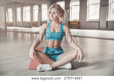 Strong Sexy Athletic Young Woman Working Out In Gym