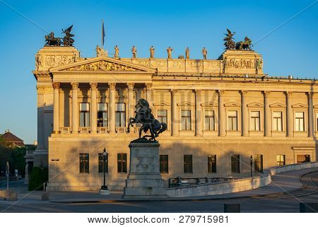 Right Side Of Parliament Building In Vienna, Austria In Sunrise Light