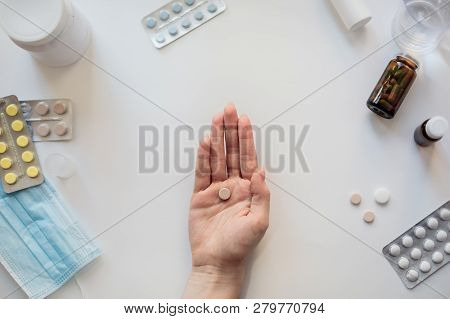 Health Care Concept, Composition With Pills And Hand On White Background, Firts Aid, Different Pills
