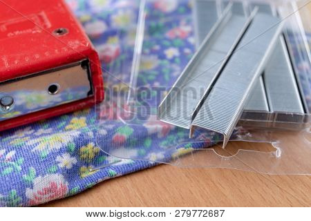 Tacker And Staples Used To Upholster Furniture. Accessories For Employees In The Carpentry Shop.