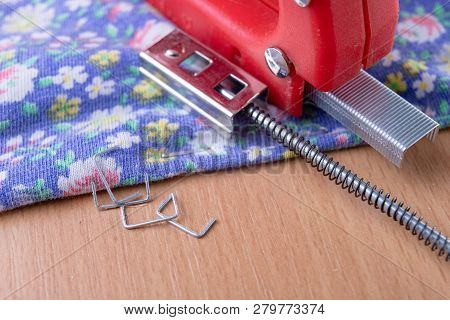 Tacker And Staples Used To Upholster Furniture. Accessories For Employees In The Carpentry Shop.