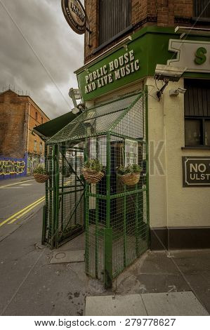 Entrance To Sunflower Public House In Belfast With Safety Cage