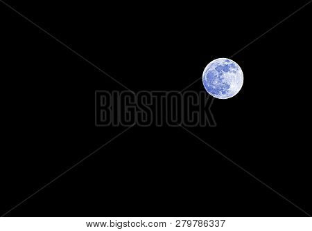 Blue Fool Moon On The Dark Sky At Midnight