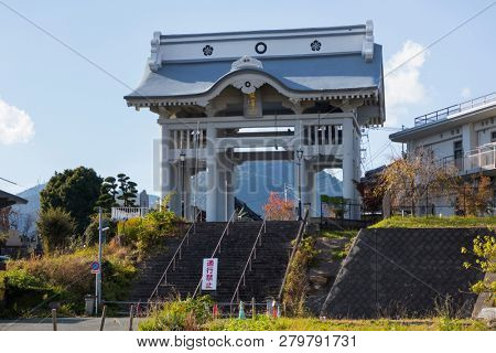 Kumamoto, Japan - November 13, 2018: Niomon Gate at Honmyo-ji Temple is being rebuilt after the earth quake  