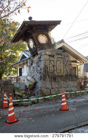 Kumamoto, Japan - November 13, 2018: Broken stone lantern at the Honmyo-ji Temple after the earth quake in 2016 