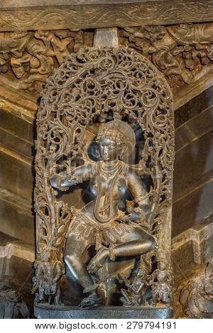 Belur, Karnataka, India - November 2, 2013: Chennakeshava Temple Building. Black Stone Statue Of Fem