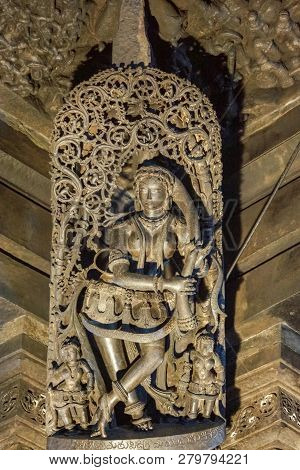 Belur, Karnataka, India - November 2, 2013: Chennakeshava Temple Building. Black Stone Statue Of Fem