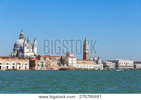 Waterfront view of Santa Maria della Salute, San Marco square and Doge's Palace in Venice, Italy