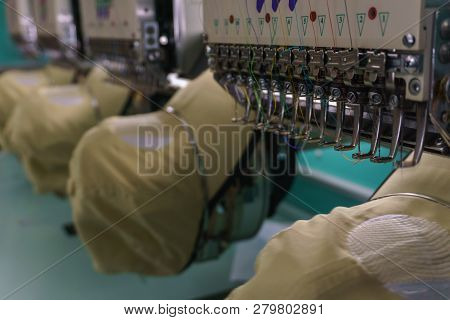 Embroidery Machine Needle In Textile Industry At Garment Manufacturers, Embroidery Cap In Progress, 