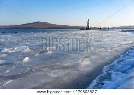 Seascape Overlooking The Tokarev Lighthouse Against The Blue Sky.