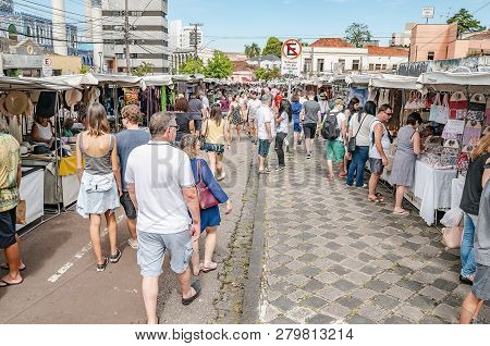 Curitiba - Pr, Brazil - December 16, 2018: People At The Sundays Fair Called Feira Do Largo Da Ordem