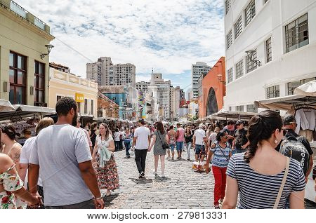 Curitiba - Pr, Brazil - December 16, 2018: People At The Sundays Fair Called Feira Do Largo Da Ordem