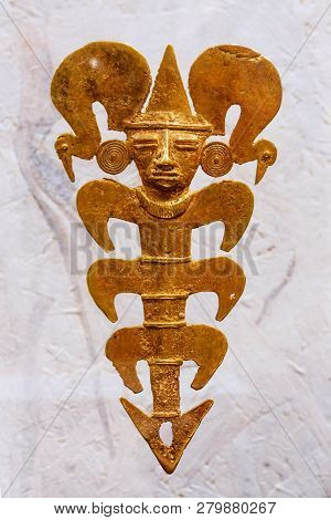 Yekaterinburg, Russia - January 17, 2019: Golden Pendant Depicting A Shaman As A Crustacean From Ura