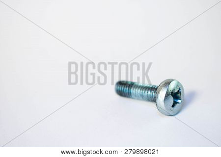 One Metal Screw Isolated On White Background Closeup