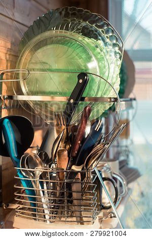 Clean Cutlery In The Dishwasher. Home Equipment. Work At Home Concept.