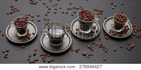 Coffee Cups And Beans On Black Color Background