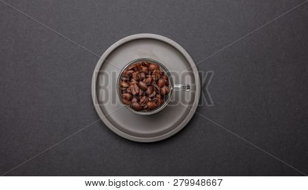 Coffee Cup And Beans On Black Color Background, Top View