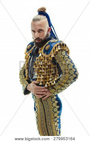 Torero In Blue And Gold Suit Or Typical Spanish Bullfighter Isolated Over White Studio Background. T