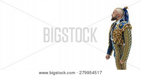Torero In Blue And Gold Suit Or Typical Spanish Bullfighter Isolated Over White Studio Background. T