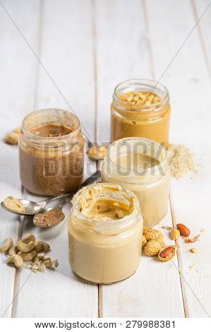 Selection Of Nut Butters - Peanut, Cashew, Almond And Sesame Seeds, Copy Space