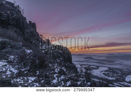 Sunrise On Boren Hill Near Bilina Town In Winter Frosty Color Morning