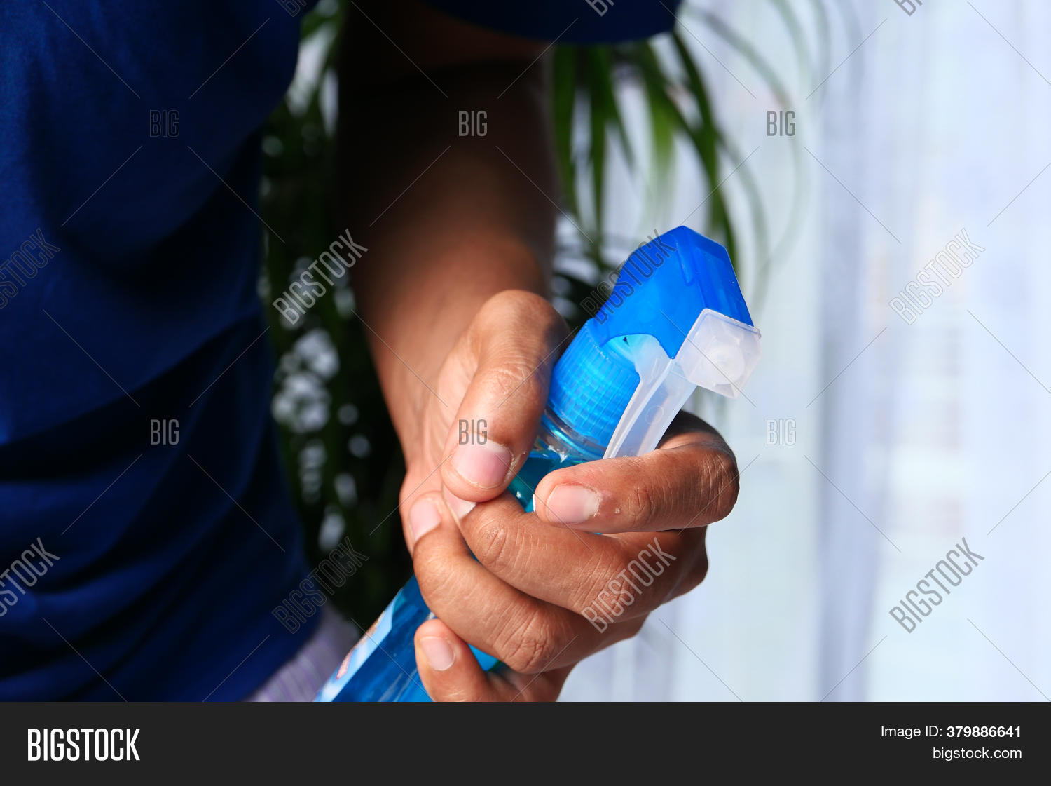 Hand Holding Spray Image & Photo (Free Trial) | Bigstock
