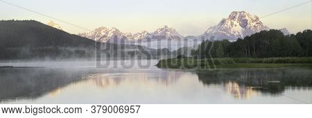 Fog Rolls In On The Snake River At Oxbow Bend At Sunrise. Oxbow Bend Is Located In Grand Teton Natio