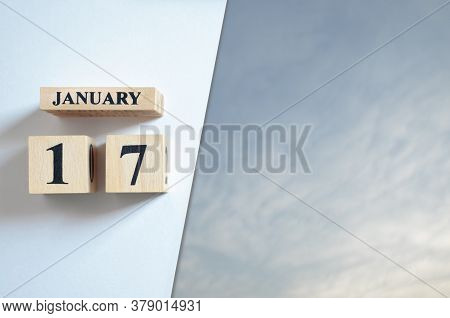 January 17, Blue Sky With Clound With Number Cube.
