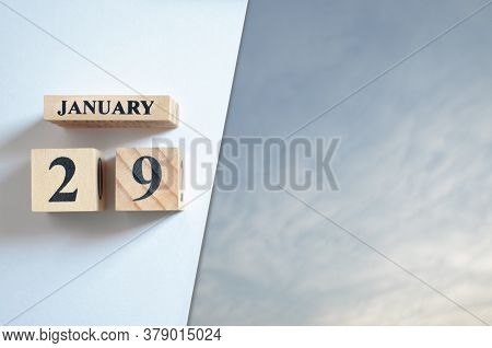 January 29, Blue Sky With Clound With Number Cube.