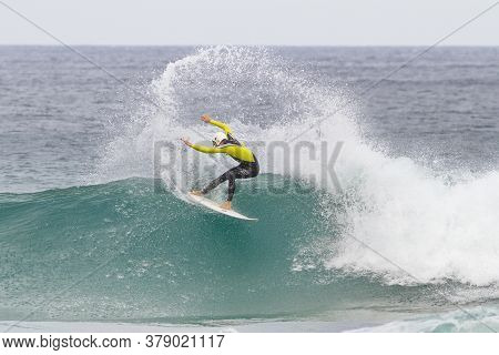 Ibarrangelua, Bizkaia/basque Country; Oct. 27, 2013. Surfer Sliding On A Wave From Laga Beach.