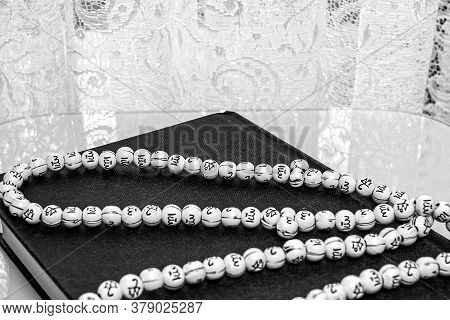 The Koran Is The Holy Book Of Muslims. Traditional  Wooden Prayer Beads