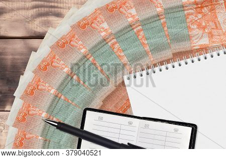 3 Cuban Pesos Convertibles Bills Fan And Notepad With Contact Book And Black Pen. Concept Of Financi