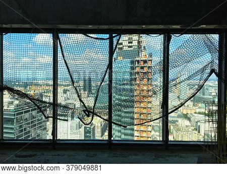 Spacious View From The 42nd Floor Of The Skyliner Warsaw Building, Through The Protective Mesh On Th