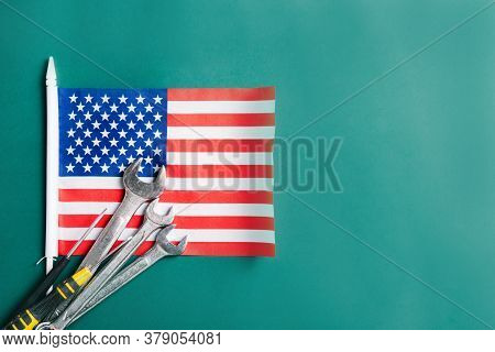 Labor Day Concept, Different Kinds Wrenches With American Flag On Dark Green. First Monday In Septem