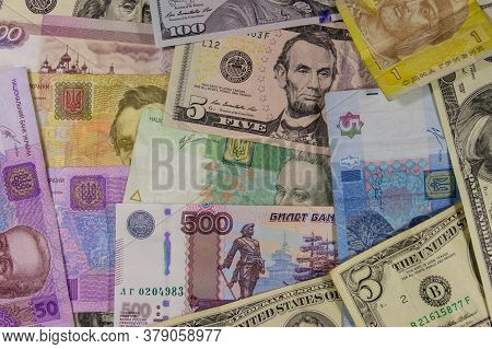 Multicurrency Background Of The Us Dollars, Russian Rubles And Ukrainian Hryvnias