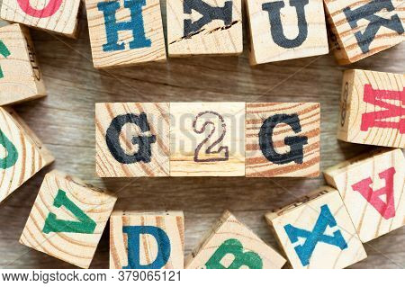 Alphabet Letter Block In Word G2g (abbreviation Of Government To Government) With Another On Wood Ba