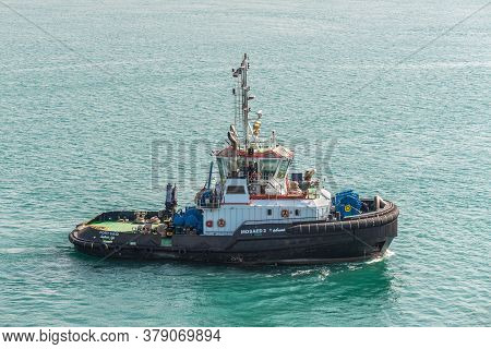 Suez, Egypt - November 14, 2019: Tugboat Mosaed 2 Accompanies The Ships. Ships Passing Through The S