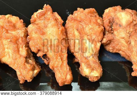Crispy Fried Chicken Drum Wing On Blackplate