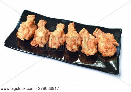 Crispy Fried Chicken Drum Wing On Blackplate