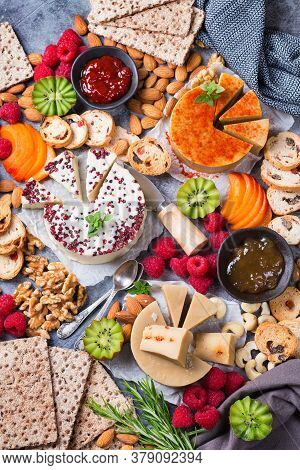 Plate Served With Assortment Of Organic Non-dairy, Raw Cheese From Cashew Nuts With Snacks, Fruits A