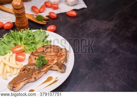 Homemade Pork Chop Steak With Salad. Online Learning For Cooking Diet And Healthy Food When Stay At 