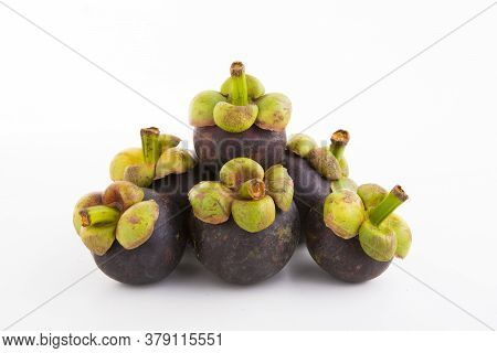 A Delicious Ripe Mangosteen On A White Background