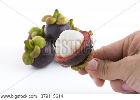 A Delicious Ripe Mangosteen On A White Background