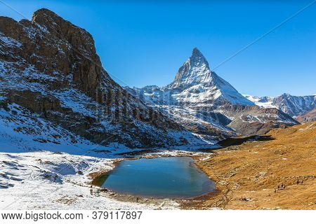 Stunning Panorama View Of The Famous Matterhorn And Peak Of Swiss Pennine Alps With Beautiful Riffel