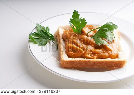 Healthy Toast With Zucchini Caviar. Russian Traditional Sandwich Served In A Plate With Herbs On A W